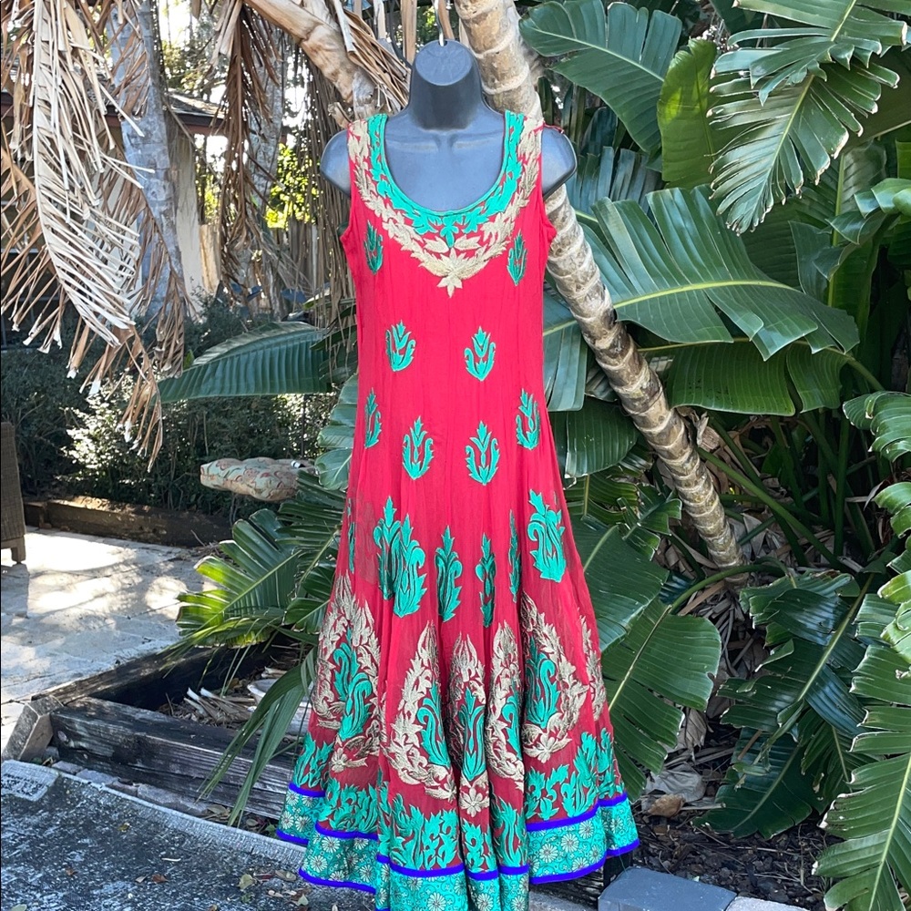 heavily embroidered for brocade, full traditional dress